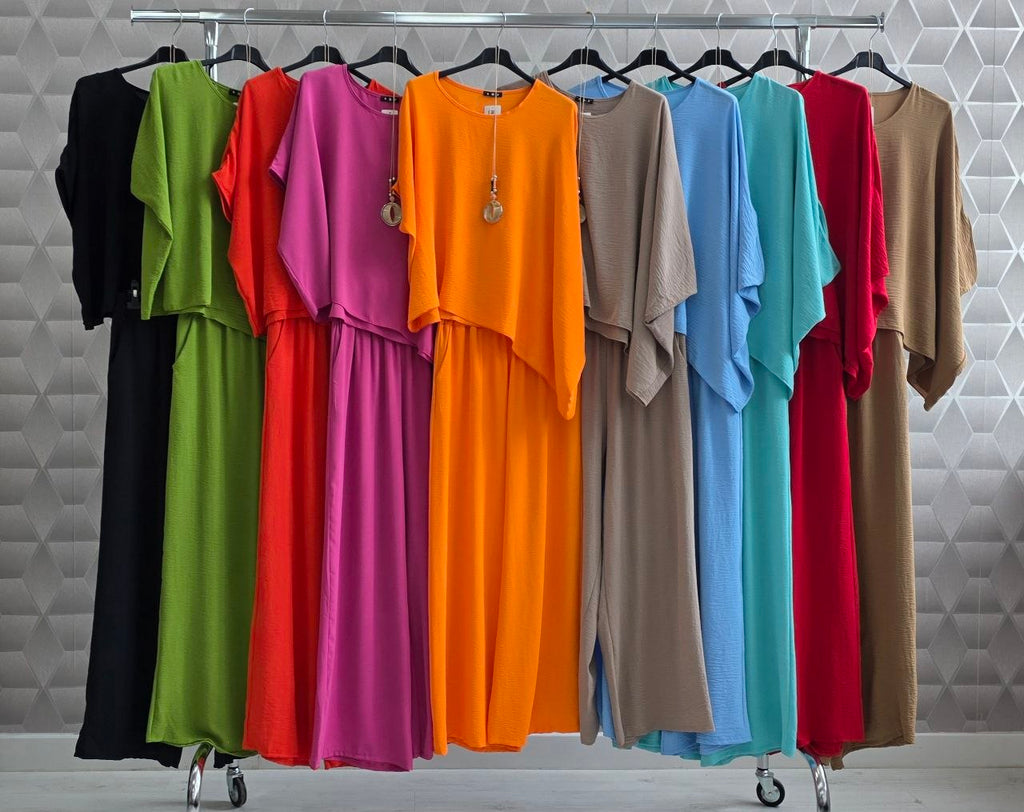 Compleu din poliester cu bluza asimetrica