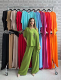 Compleu din poliester cu bluza asimetrica